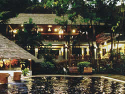 Enjoy a meal while overlooking the swimming pool