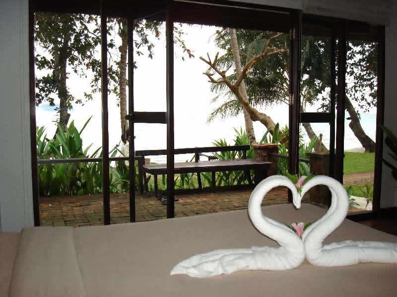 view over the sea and terrace of a Baan Yong Yuth buri bungalow